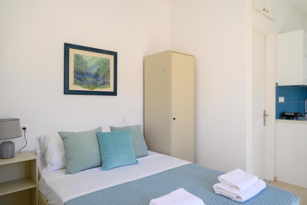 Postel nebo postele na pokoji v ubytování Artemis apartment first floor