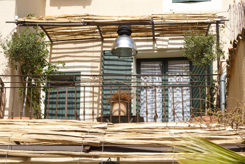 Domácí mazlíčci ubytovaní s hosty v ubytování Le 215 Gambetta boutique hôtel en Provence