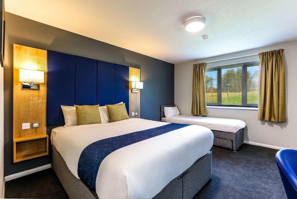 Postel nebo postele na pokoji v ubytování Days Inn Hotel Gretna Green