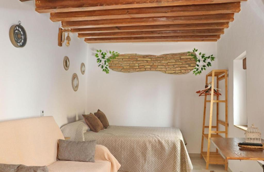Postel nebo postele na pokoji v ubytování Estudio La Piedra