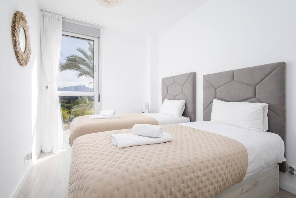 Posteľ alebo postele v izbe v ubytovaní Stunning views and apartment Oceana Views RDR488