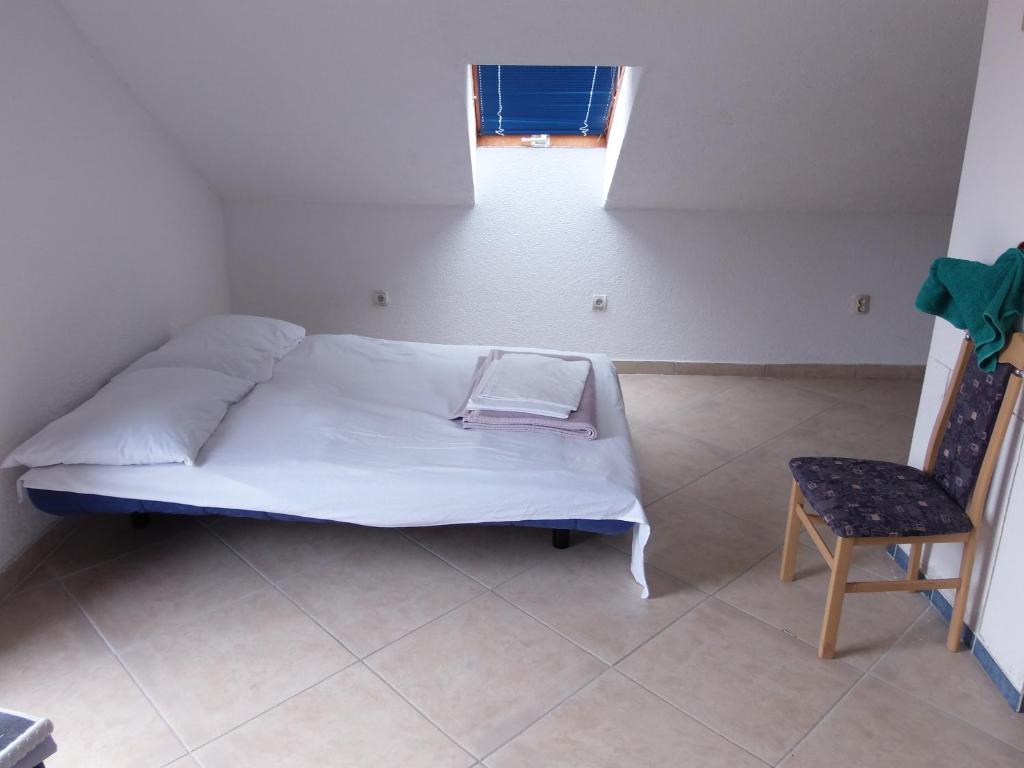 Postel nebo postele na pokoji v ubytování Apartments 031