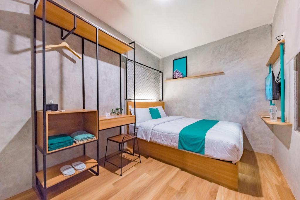 Postel nebo postele na pokoji v ubytování Ultima Guest House