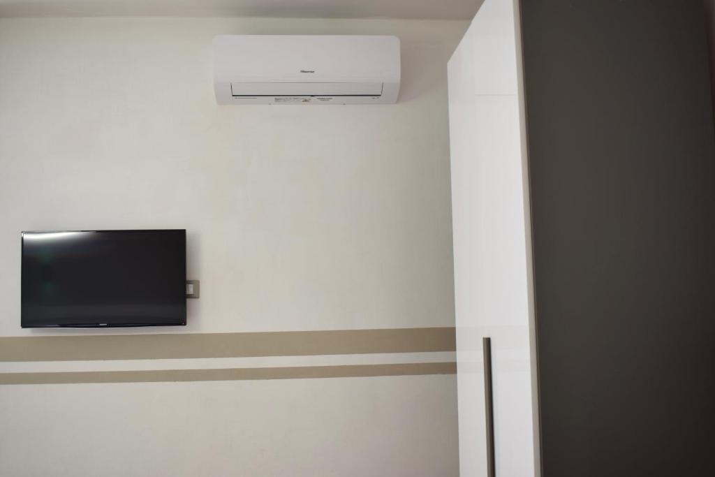 TV a/nebo společenská místnost v ubytování Good Vibes
