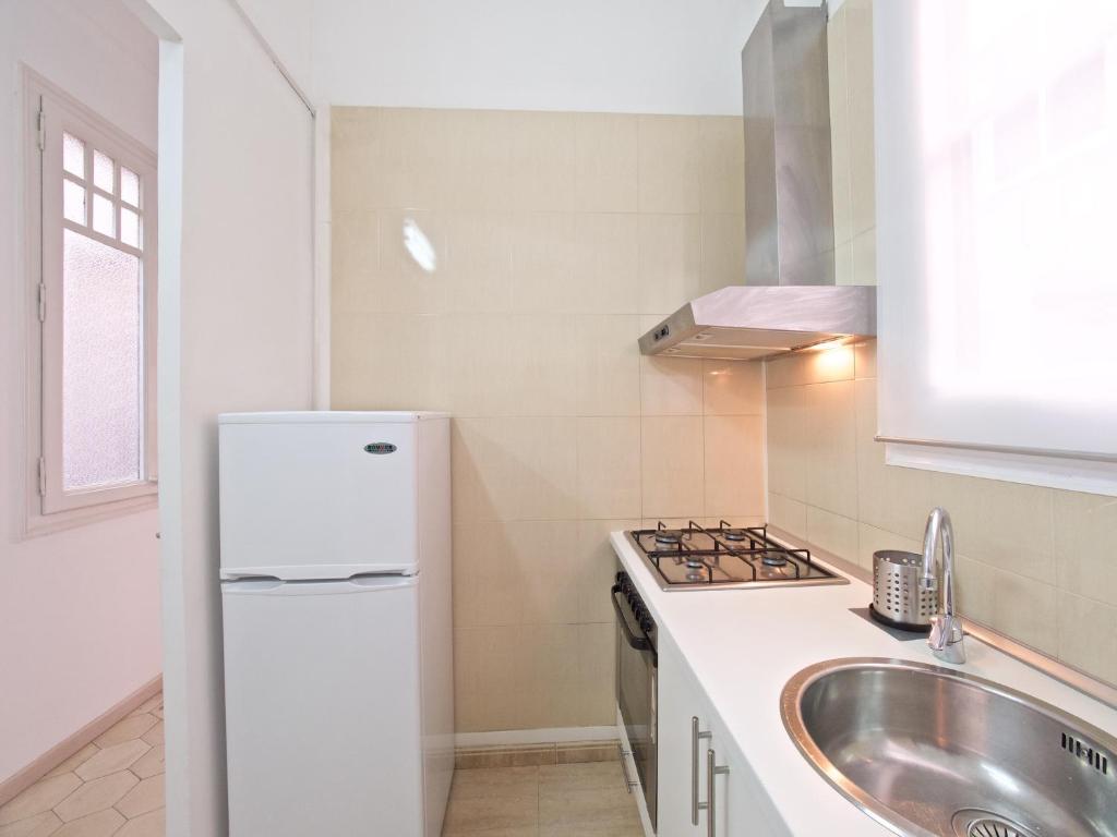 Kuchyňa alebo kuchynka v ubytovaní Suites4days Gaudi Eixample