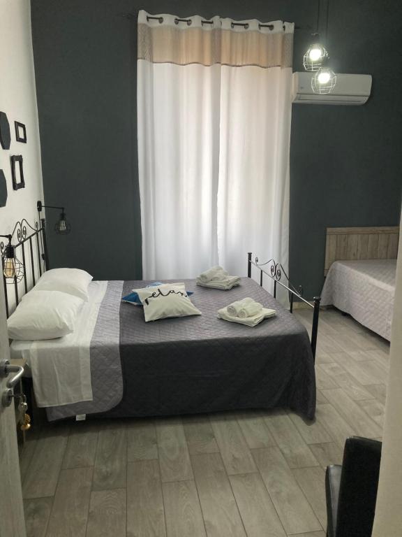 Postel nebo postele na pokoji v ubytování DAREB HOME vista mare