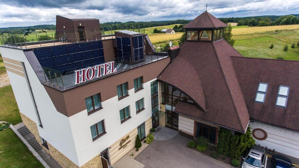 an overhead view of a hotel with a building at Hotel Porto in Plungė