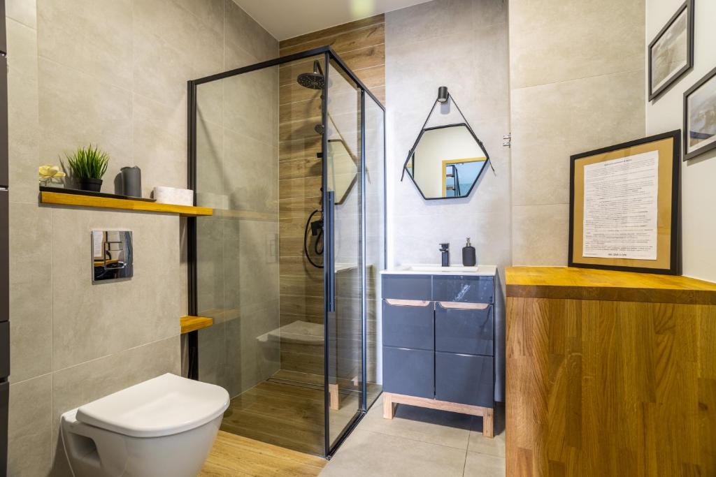 Kúpeľňa v ubytovaní Apartamenty Cisza & Spoko! - ACCO RENT