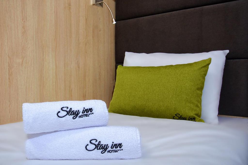 Postel nebo postele na pokoji v ubytování Stay inn Hotel Gdańsk