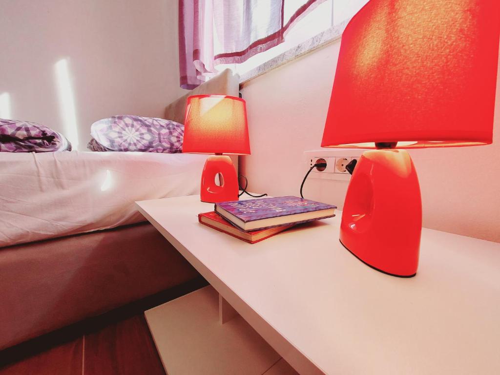 Postel nebo postele na pokoji v ubytování Apartmani Mario