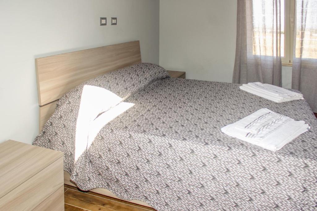 Postel nebo postele na pokoji v ubytování Villa Ada