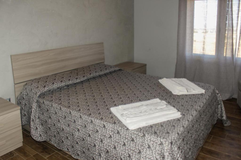 Postel nebo postele na pokoji v ubytování Villa Ada