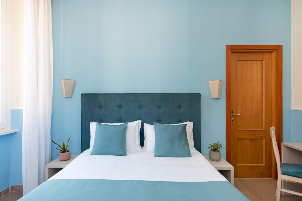 Postel nebo postele na pokoji v ubytování Hotel Parker - Gruppo BLAM HOTELS