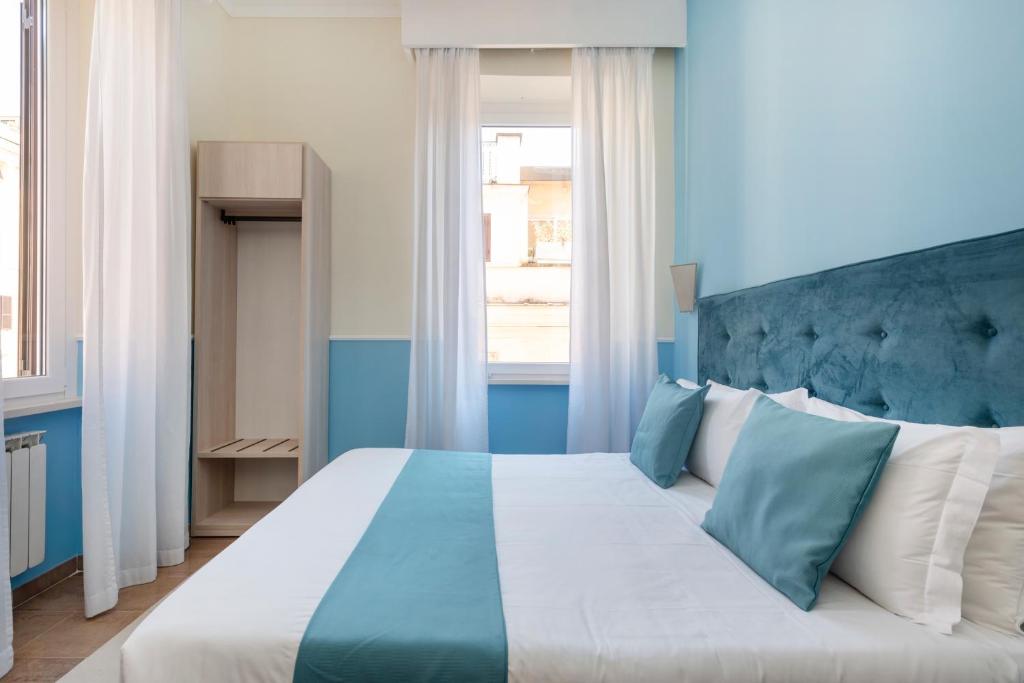 Postel nebo postele na pokoji v ubytování Hotel Parker - Gruppo BLAM HOTELS