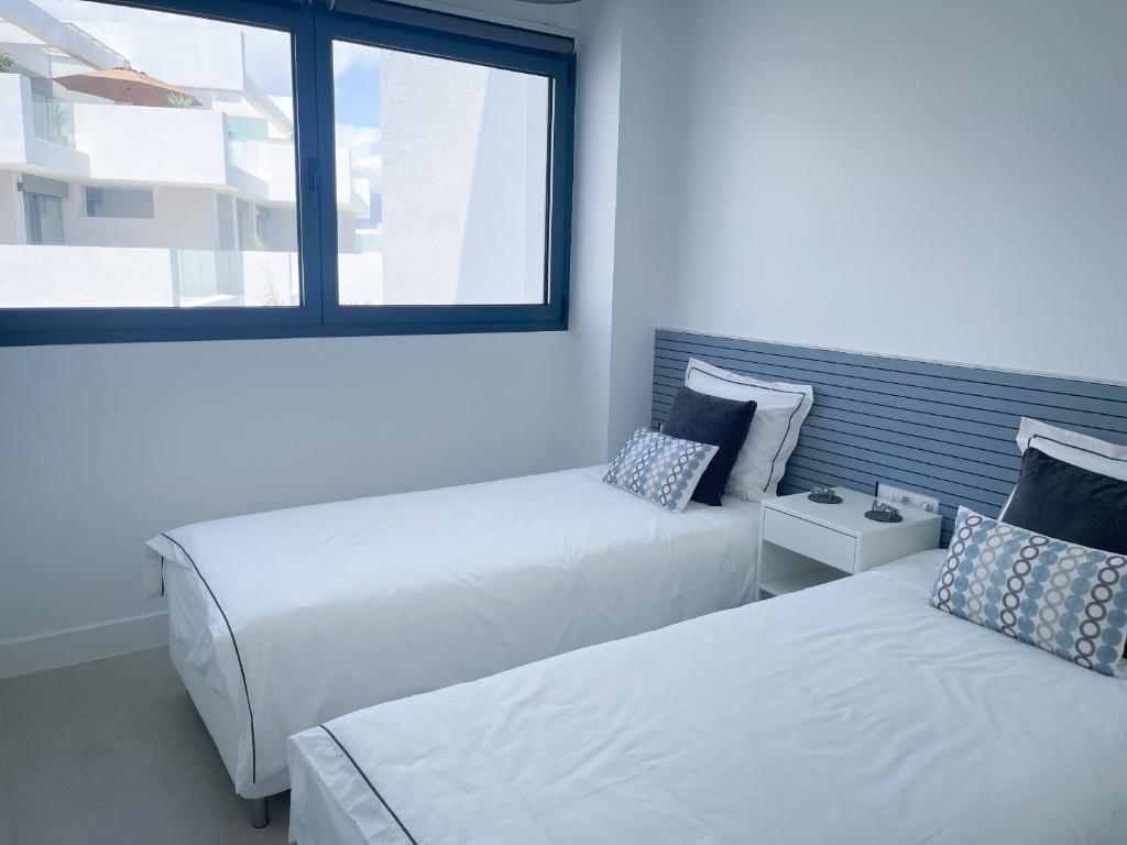 Posteľ alebo postele v izbe v ubytovaní Pure South Residence