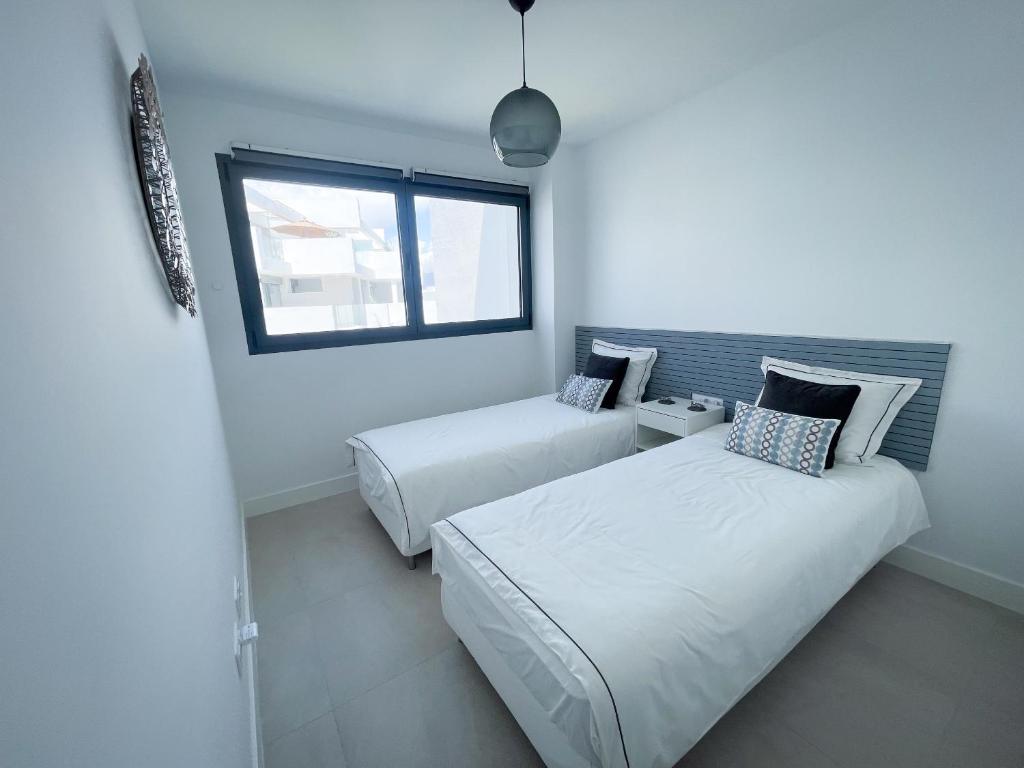 Posteľ alebo postele v izbe v ubytovaní Pure South Residence