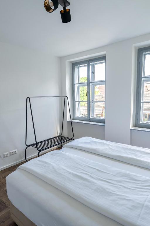 Postel nebo postele na pokoji v ubytování ON 6 Rust