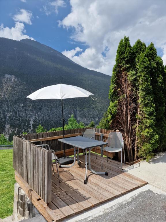 Nespecifikovaný výhled na hory nebo výhled na hory při pohledu z apartmánu