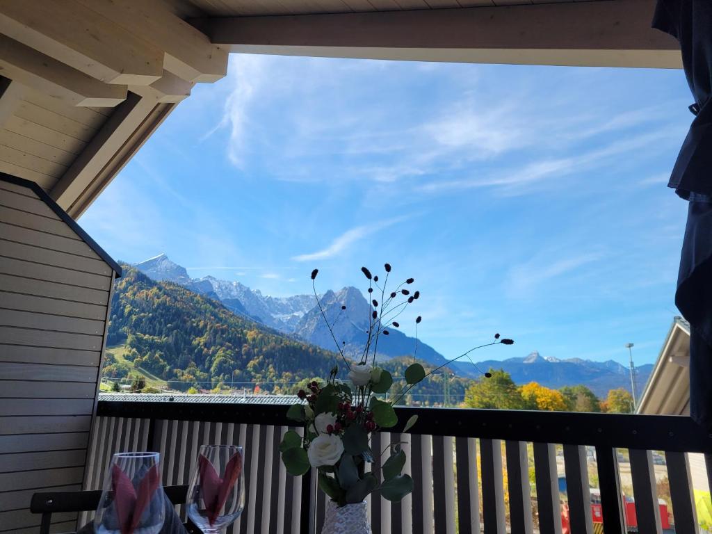a balcony with a view of the mountains at Alpenglück-Garmisch in Garmisch-Partenkirchen