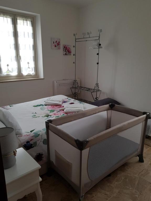 Posteľ alebo postele v izbe v ubytovaní Bed & Breakfast La Tana dei Sognatori