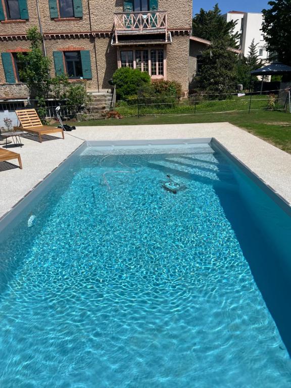 Bazén v ubytovaní O'Cottage suite Familiale alebo v jeho blízkosti