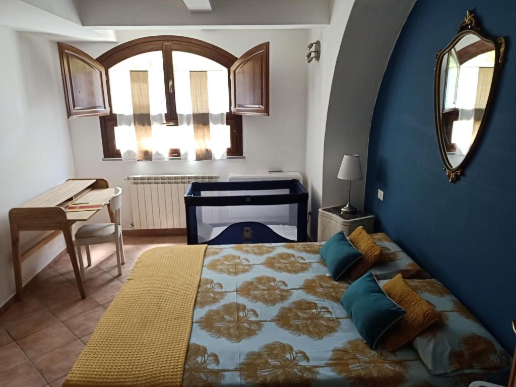 Postel nebo postele na pokoji v ubytování La Casa di Filippo
