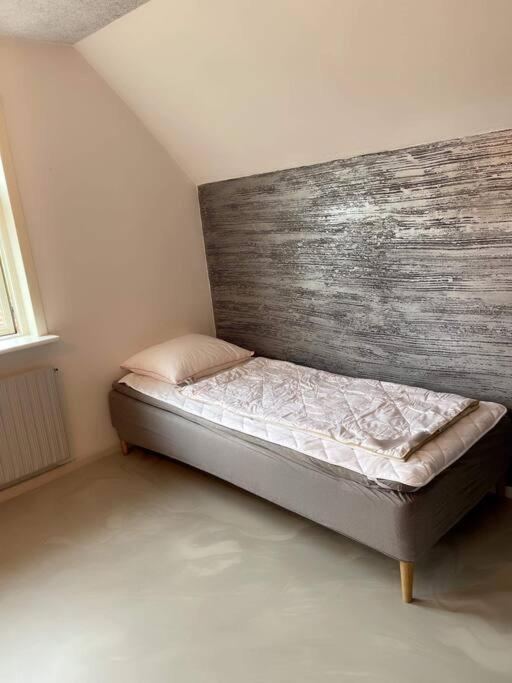Postel nebo postele na pokoji v ubytování Casa del Stadil