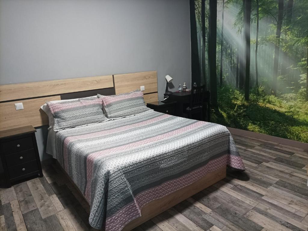 Cama o camas de una habitación en Hostal El Bosque Encantado Toledo