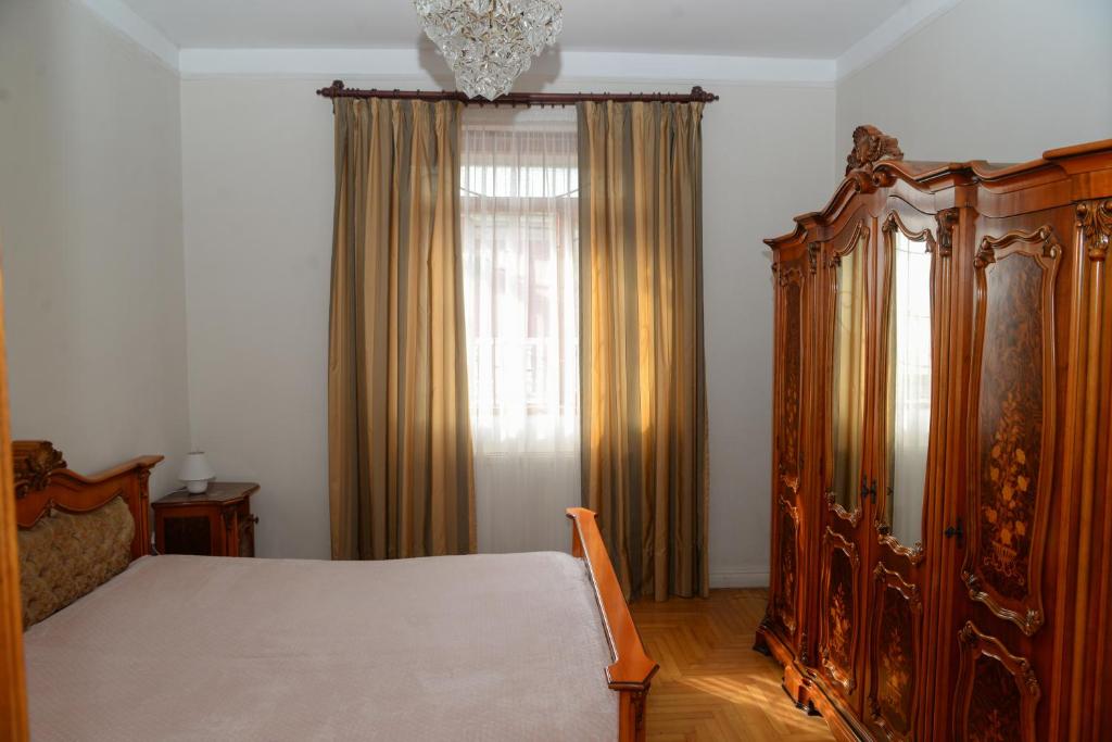 Postel nebo postele na pokoji v ubytování Kvariati Residence