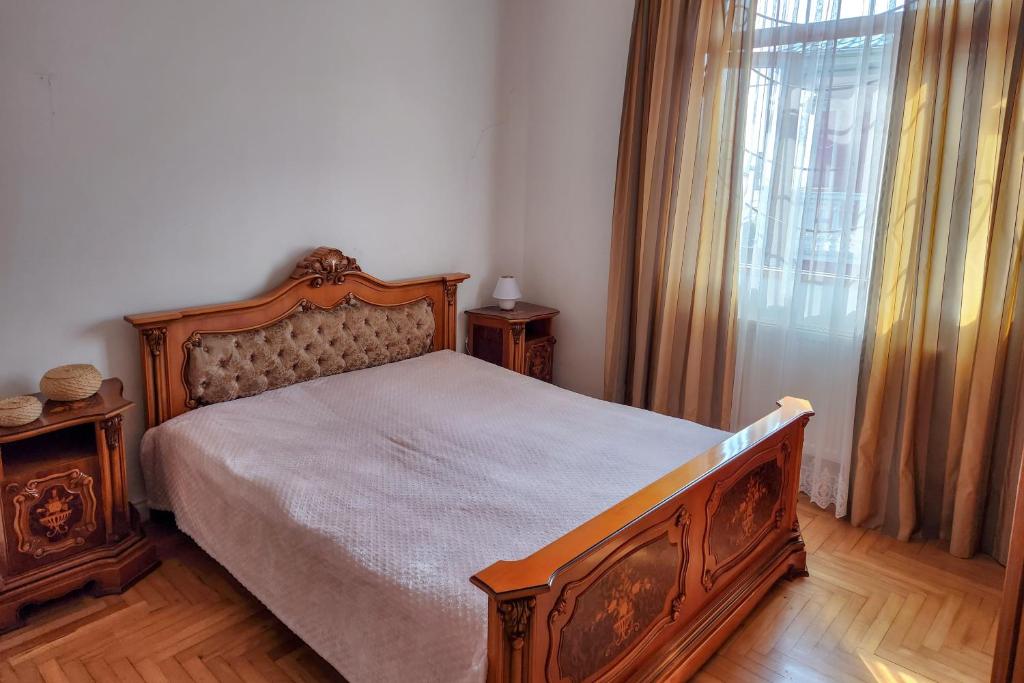 Postel nebo postele na pokoji v ubytování Kvariati Residence