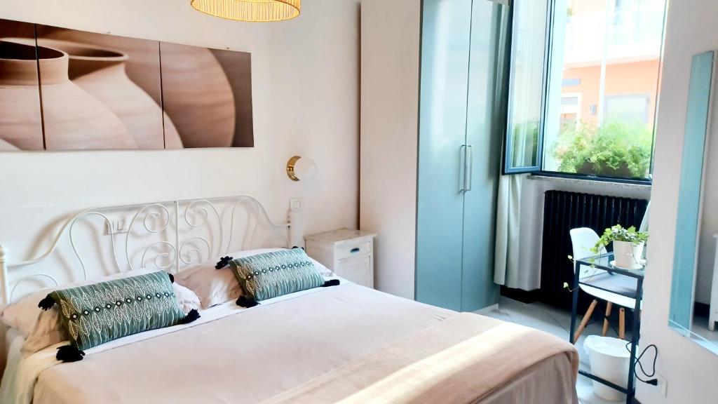 Postel nebo postele na pokoji v ubytování B&B La Volpina