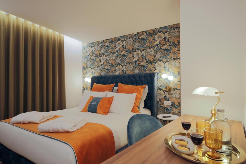 Postel nebo postele na pokoji v ubytování A Tendinha - Guest House