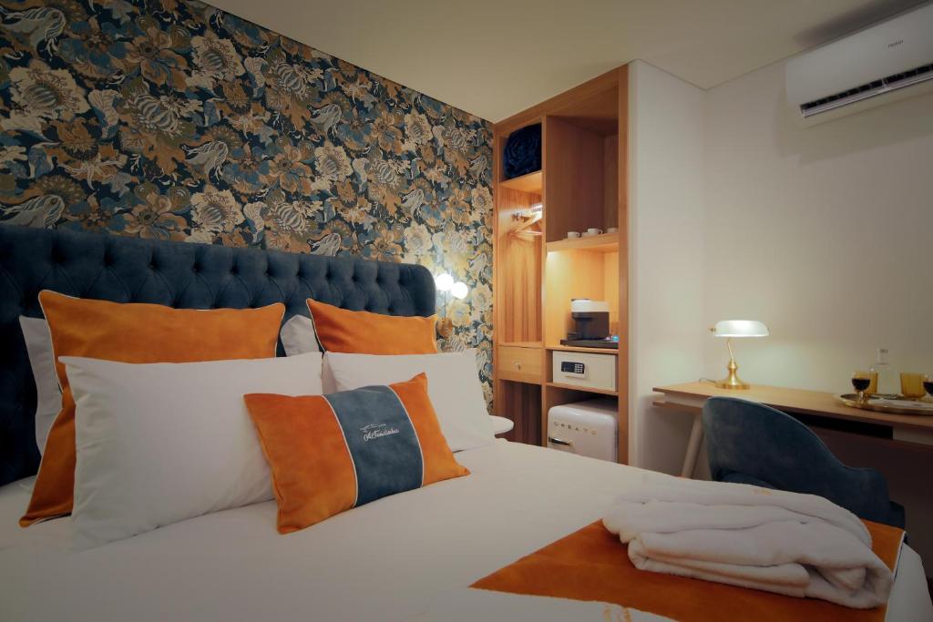 Postel nebo postele na pokoji v ubytování A Tendinha - Guest House