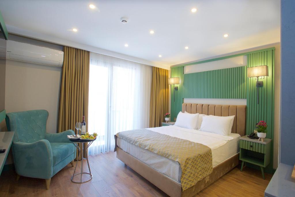 Postel nebo postele na pokoji v ubytování Çanakkale Bosphorus Port Aspen Hotel
