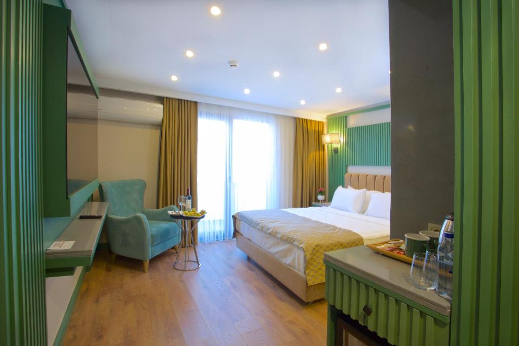 Postel nebo postele na pokoji v ubytování Çanakkale Bosphorus Port Aspen Hotel