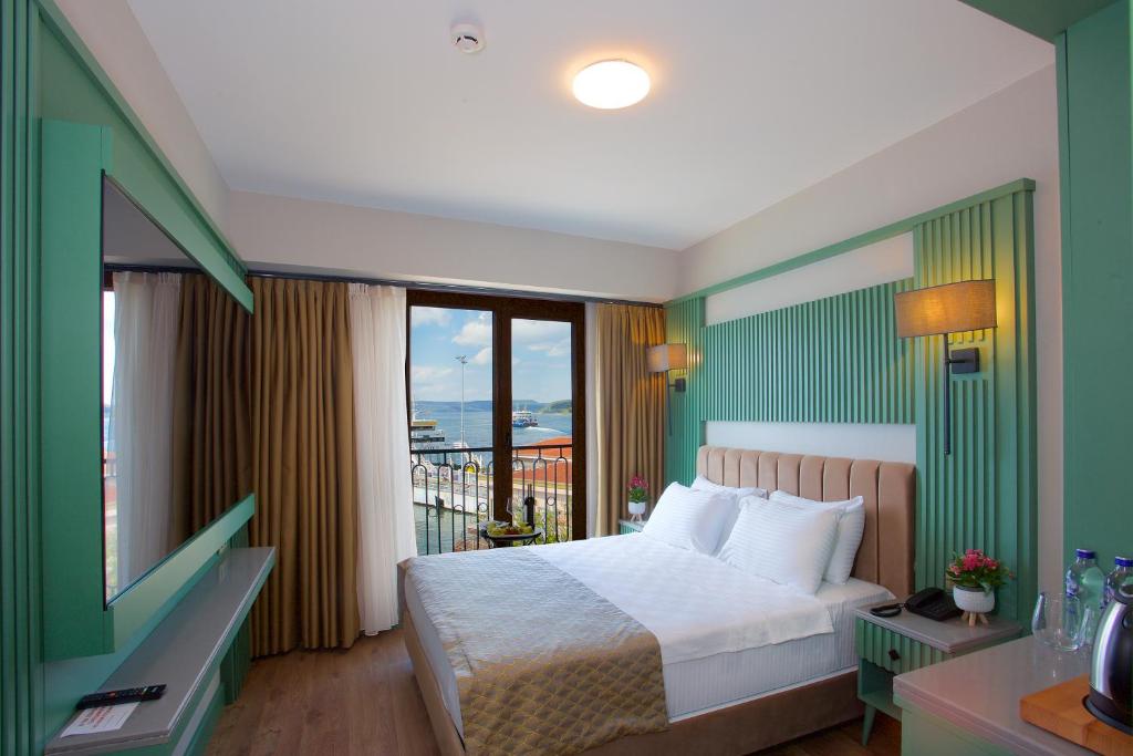 Postel nebo postele na pokoji v ubytování Çanakkale Bosphorus Port Aspen Hotel