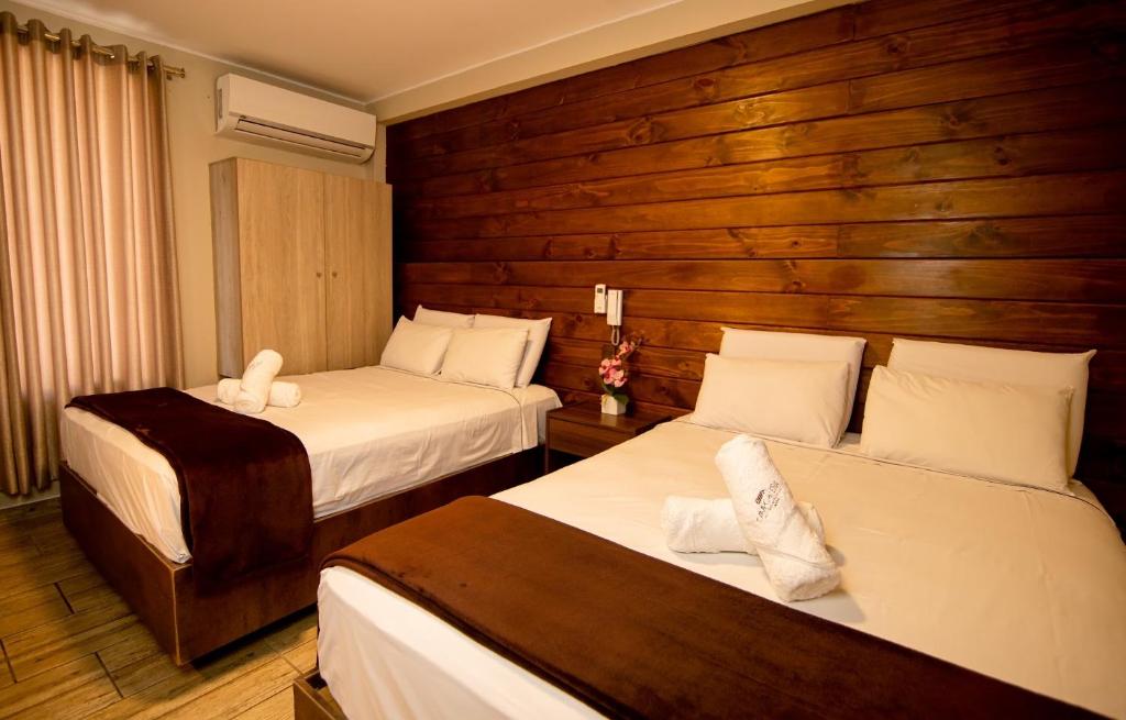 Postel nebo postele na pokoji v ubytování Hotel Campo & Leña