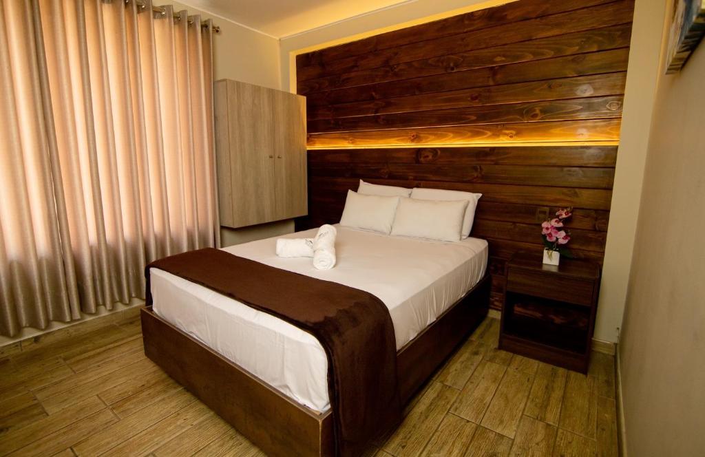 Postel nebo postele na pokoji v ubytování Hotel Campo & Leña