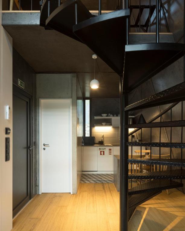 Uma cama ou camas num quarto em Syntony Hotels - Paradinha Village