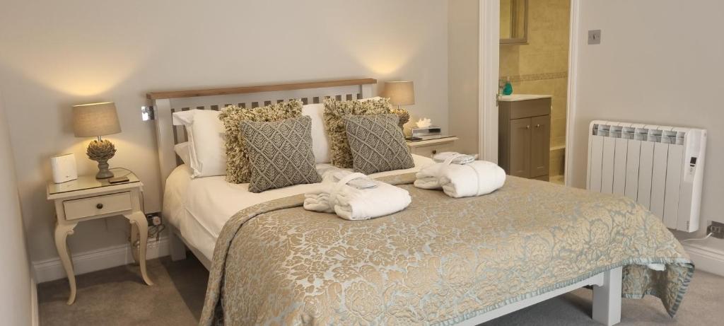 Postel nebo postele na pokoji v ubytování La Haule Manor