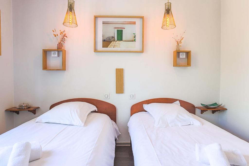 Postel nebo postele na pokoji v ubytování Hotel Bistrot FINE