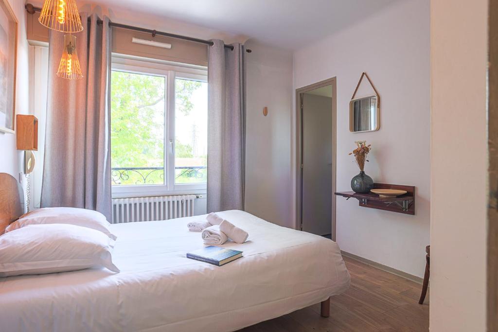 Postel nebo postele na pokoji v ubytování Hotel Bistrot FINE