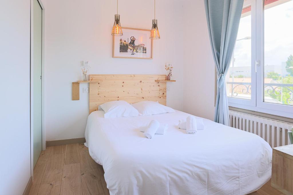 Postel nebo postele na pokoji v ubytování Hotel Bistrot FINE