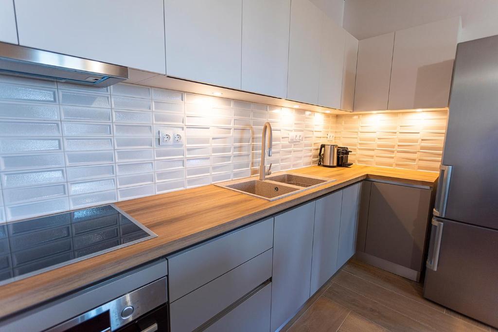 Kuchyň nebo kuchyňský kout v ubytování SeaeyeVillas 2