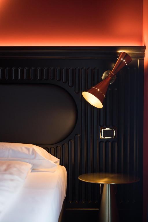 Postel nebo postele na pokoji v ubytování Hotel Miro'