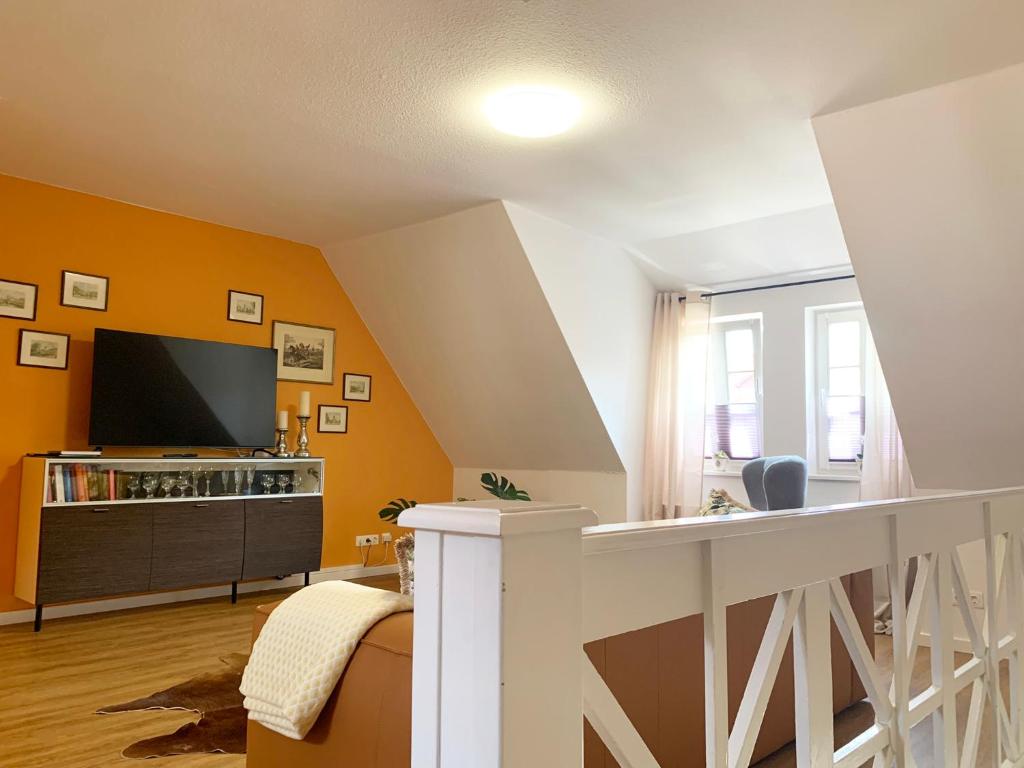 TV a/nebo společenská místnost v ubytování Ferienwohnung am Südwall All INCLUSIVE