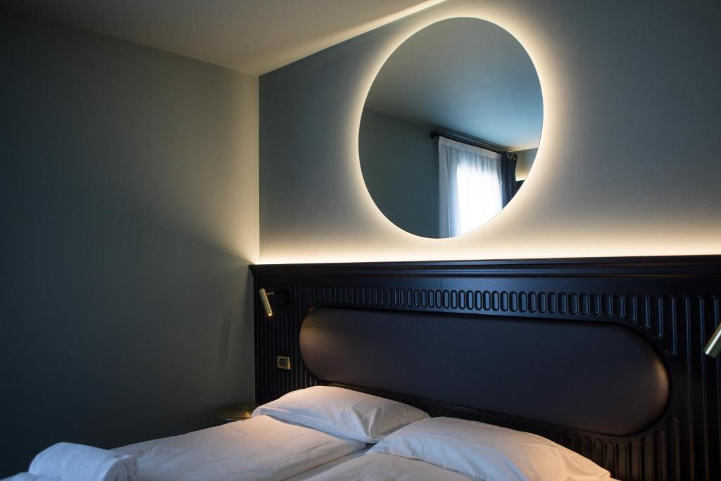 Postel nebo postele na pokoji v ubytování Hotel Miro'