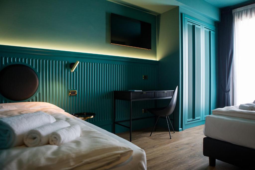Postel nebo postele na pokoji v ubytování Hotel Miro'