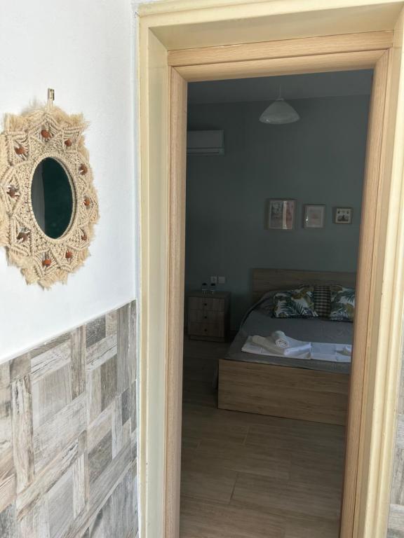 Postel nebo postele na pokoji v ubytování ZeusPlace Akti Platamonas