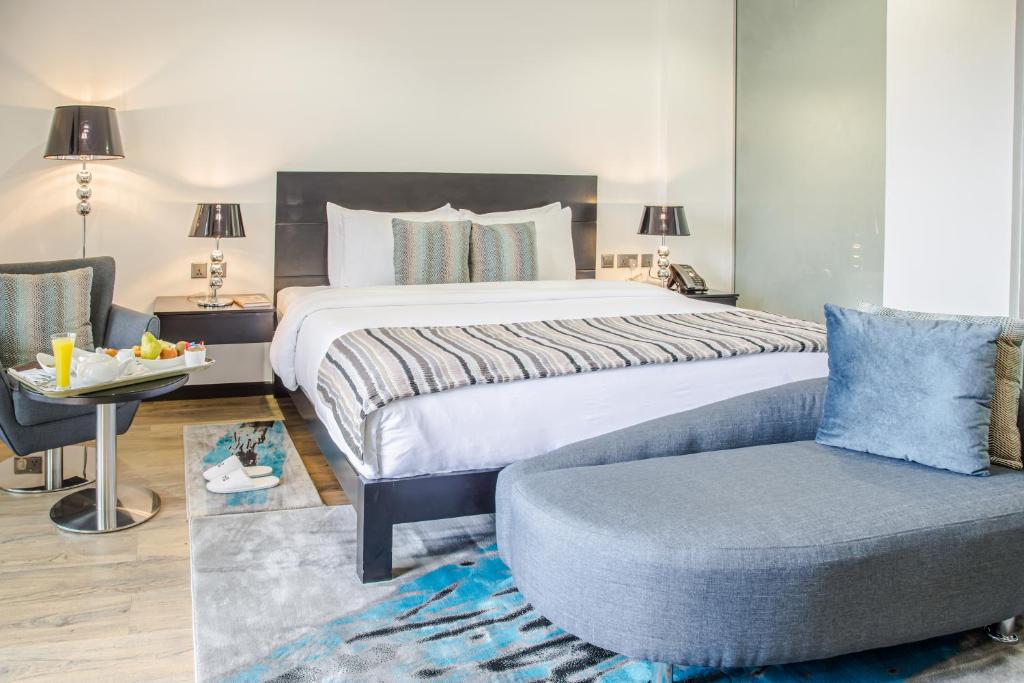 Postel nebo postele na pokoji v ubytování Amaryllis Hotel Blantyre